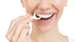 Teeth cleaning by a licensed dental hygienist or dentist